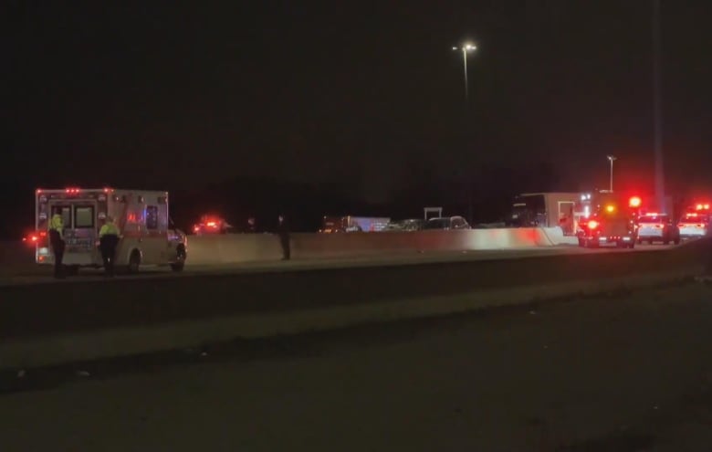 Emergency services vehicles at the scene of a deadly crash on Highway 401 in Whitby on April 29, 2024.