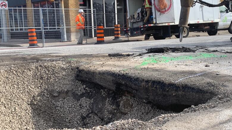 A day after the road collapsed at University Avenue West at Church Street in downtown Windsor, Ont., in Apr. 2024.