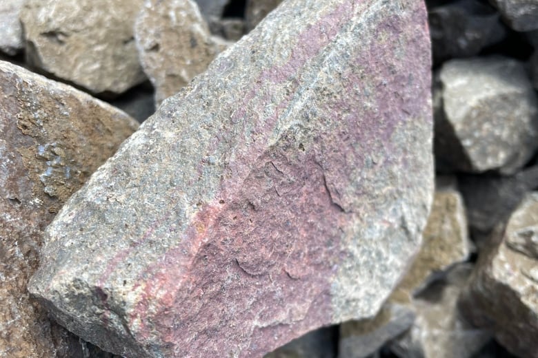 Grey and pink coloured rock