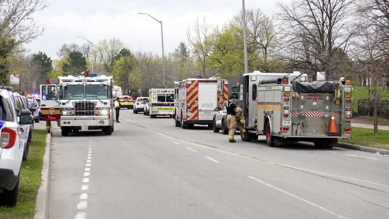 Emergency vehicles on a road.