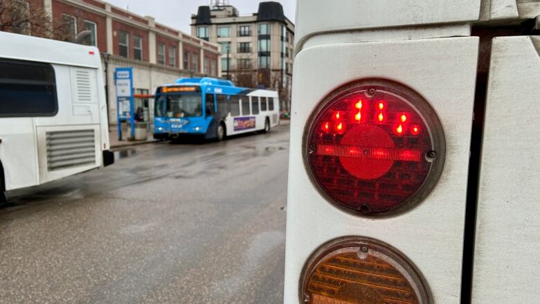 The tailights of a transit bus.