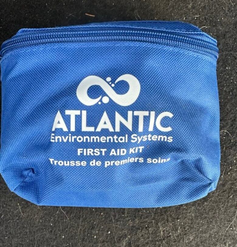 A blue bag with the logo of Atlantic Environmental Systems on it. 