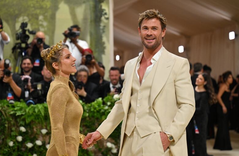 TOPSHOT - Australian actor Chris Hemsworth (R) and wife Spanish model and actress Elsa Pataky arrive for the 2024 Met Gala at the Metropolitan Museum of Art on May 6, 2024, in New York. The Gala raises money for the Metropolitan Museum of Art's Costume Institute. The Gala's 2024 theme is 