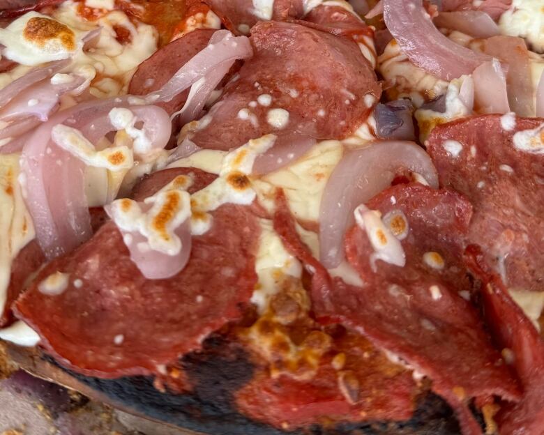 a close up of pizza 