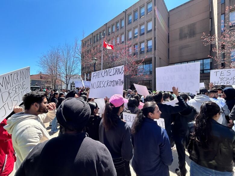 Protesters gathered in front of government buildings on Richmond Street.