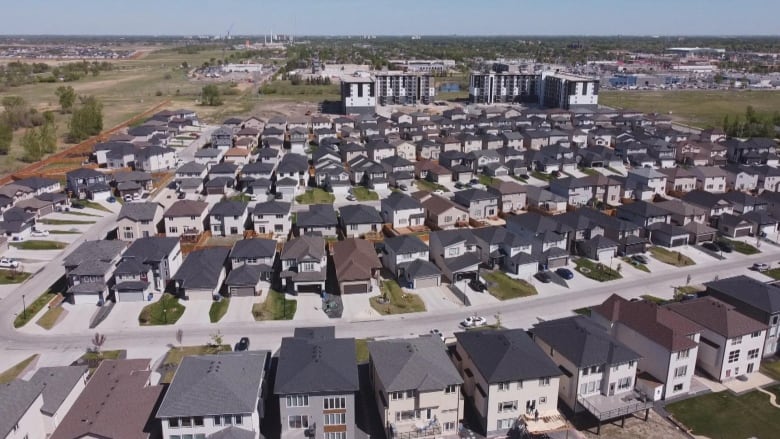 An aerial view of a number of streets and homes.