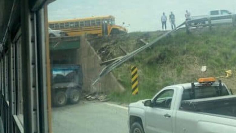 View of a vehicular crash from a bus winder.