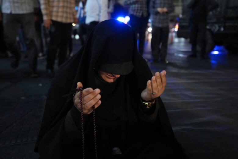 A woman prays