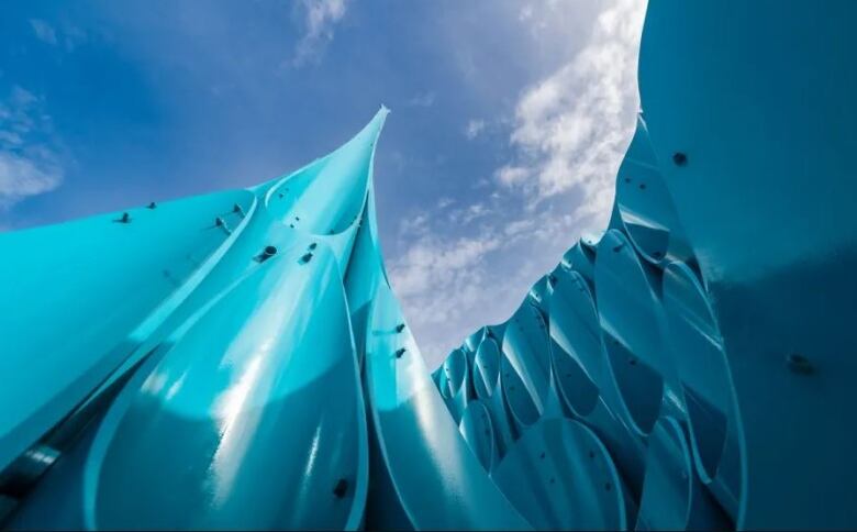 Steel tubes that are a part of a public art piece are seen from a top down angle.