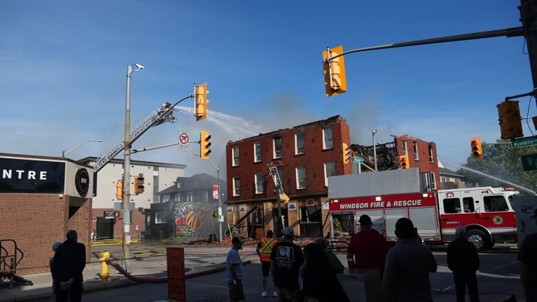 The roof of a three-floor building near downtown Windsor, Ont., has collapsed after the structure was ravaged by fire.