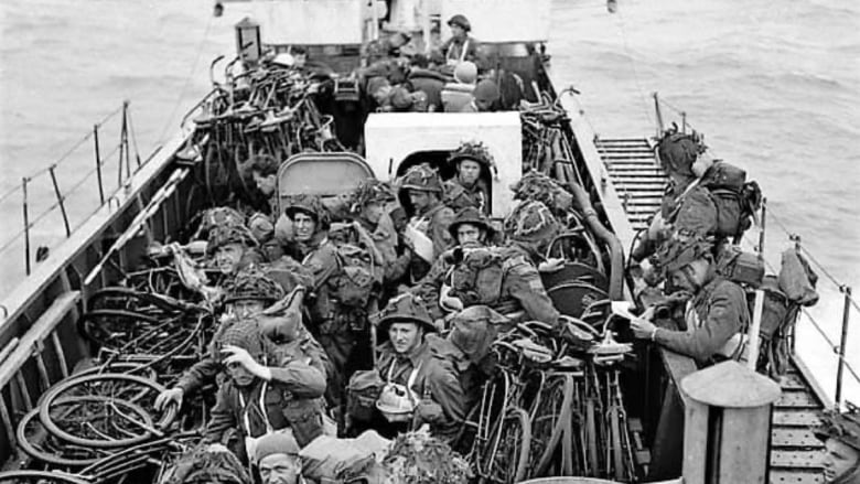 A landing craft on D-Day, full of troops.