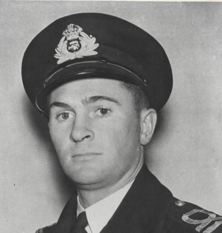 Head shot of Robert MacMillan in uniform, in black and white.