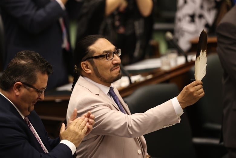 Decades after being punished in a residential school for speaking his own language, First Nation MPP Sol Mamakwa rises during question period at Queens Park to ask a question in Oji-Cree.