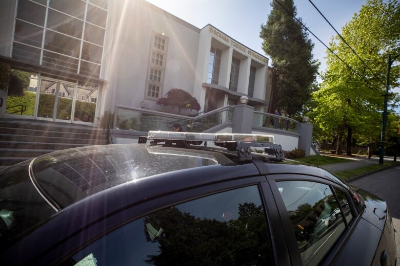 A police car is seen outside of the Congregation Schara Tzedeck Synagogue in Vancouve