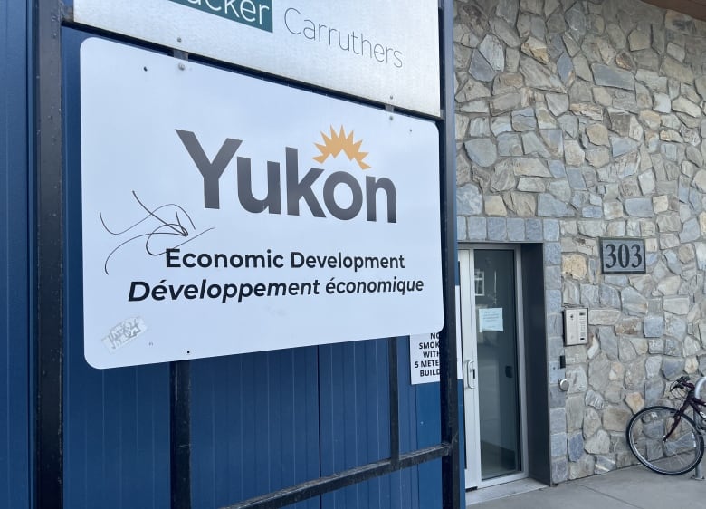 A sign outside of a building reads, 'Yukon Economic Development.'