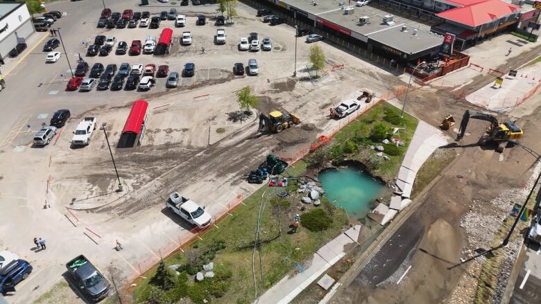 A drone shot of a water main break.