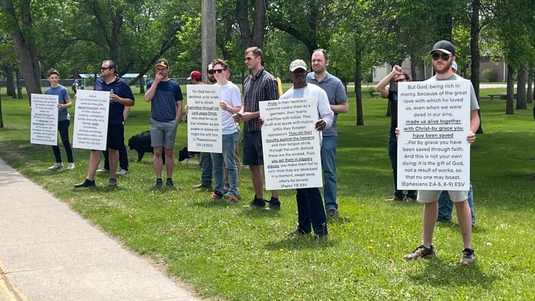 People holding signs