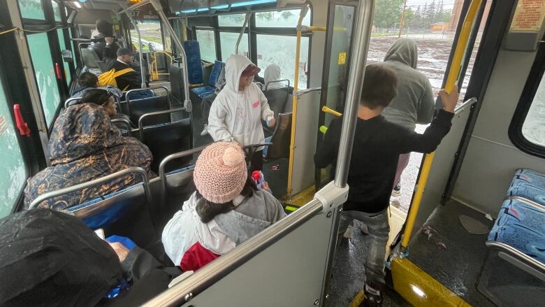 people on bus