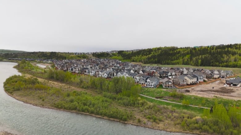 An aerial shot of a town is shown.