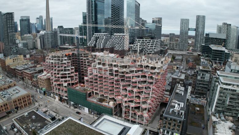 The toronto skyline and  a building under construction