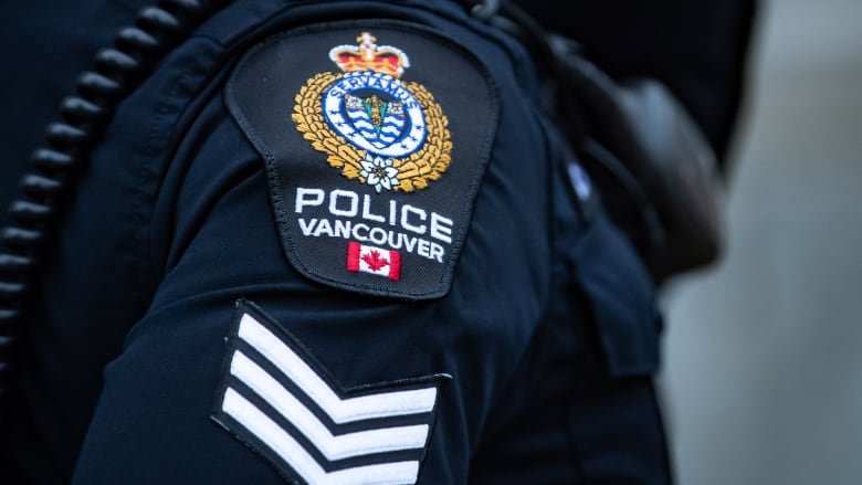 An up-close picture of a Vancouver Police Department shoulder badge.