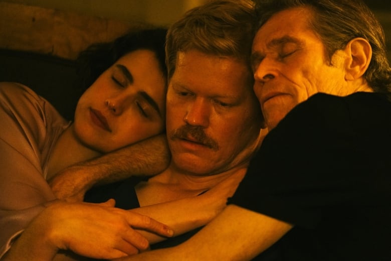 Margaret Qualley, Jesse Plemons and Willem Dafoe hug in the film Kinds of Kindness.