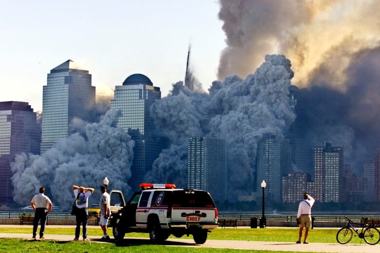 Smoke billows over the Manhattan skyline.