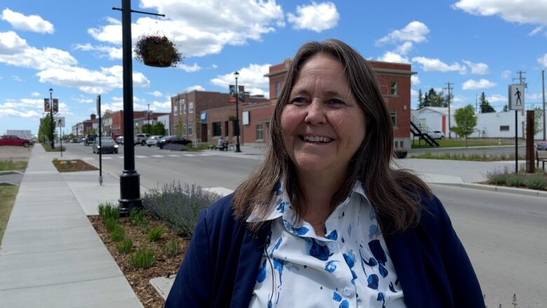 The mayor of Crossfield, Alta. is pictured on Railway Street, near the Canada Post office.