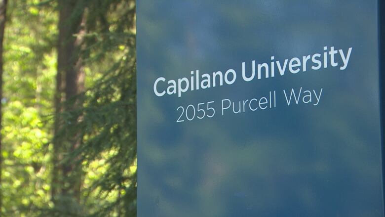 A sign reading 'Capilano University 2055 Purcell Way'.