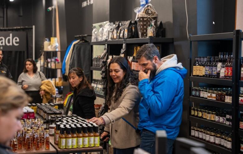 Jars can be seen on counters as people browse and point out items.