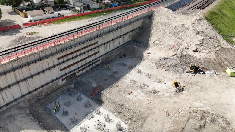 An aerial view of a construction site is pictured.