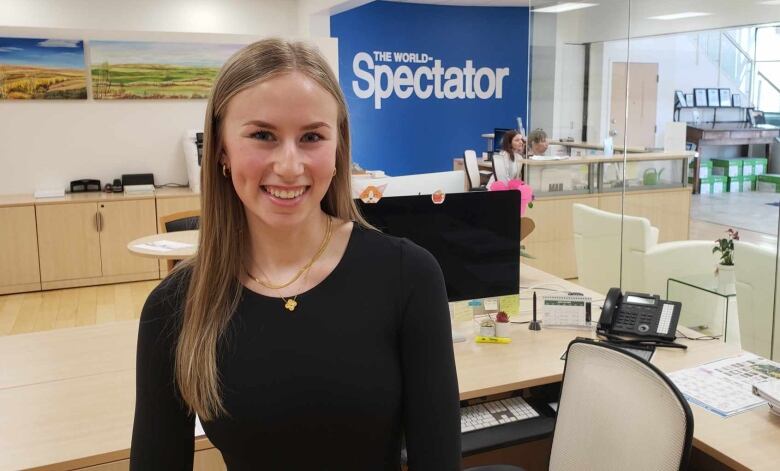 Ashley Bochek stands for a photo in the World-Spectator office.