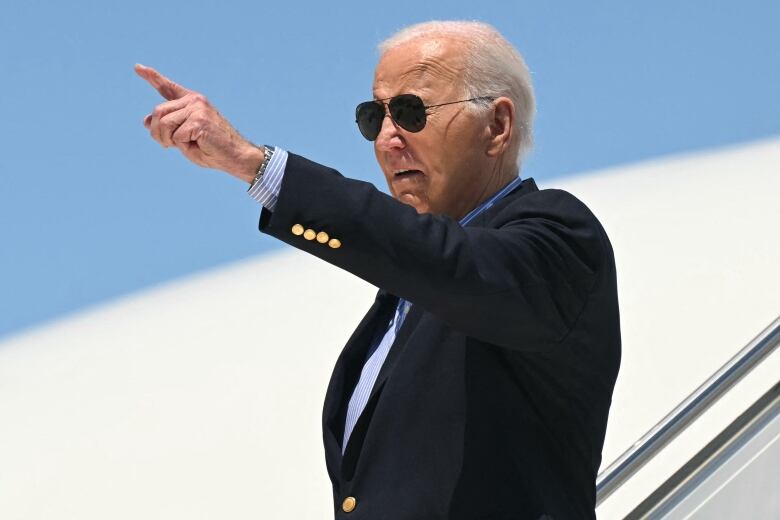 U.S. President Joe Biden disembarks from Air Force One in Madison, Wis.