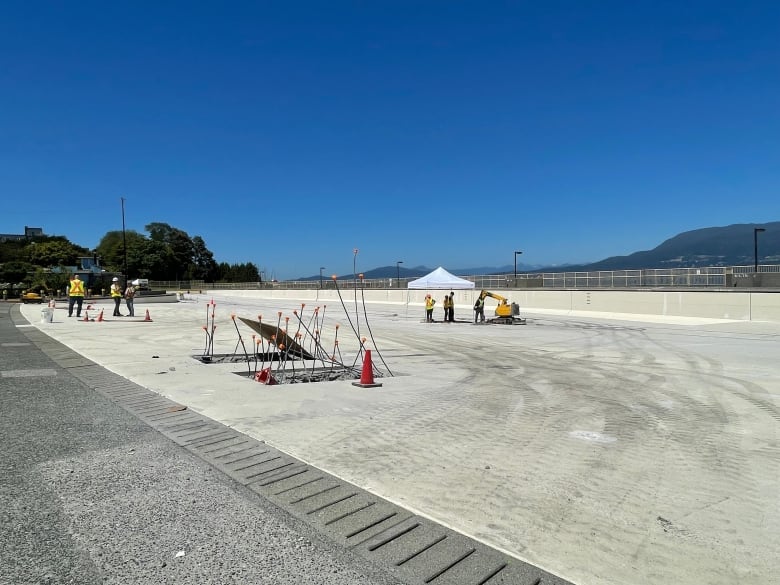 Workers at Kits pool in Vancouver do repairs on Friday July 5, 2024.