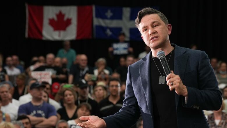 Conservative Leader Pierre Poilievre speaks during a rally in Montreal on Wednesday, June 19, 2024.