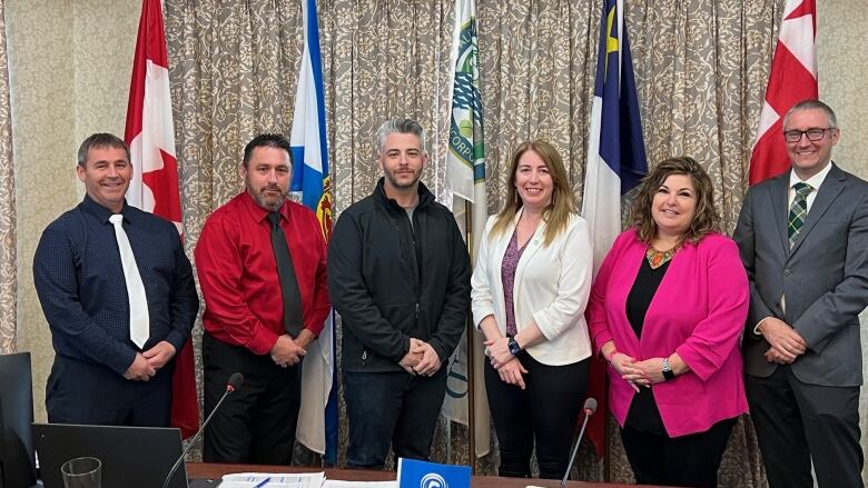 Richmond County confirmed the sale of the former West Richmond Education Centre to Arichat-based BRELA Construction in May. BRELA project developer Jeremey Carroll (third from left) is seen here with Richmond Warden Amanda Mombourquette (third from right) and her council. 