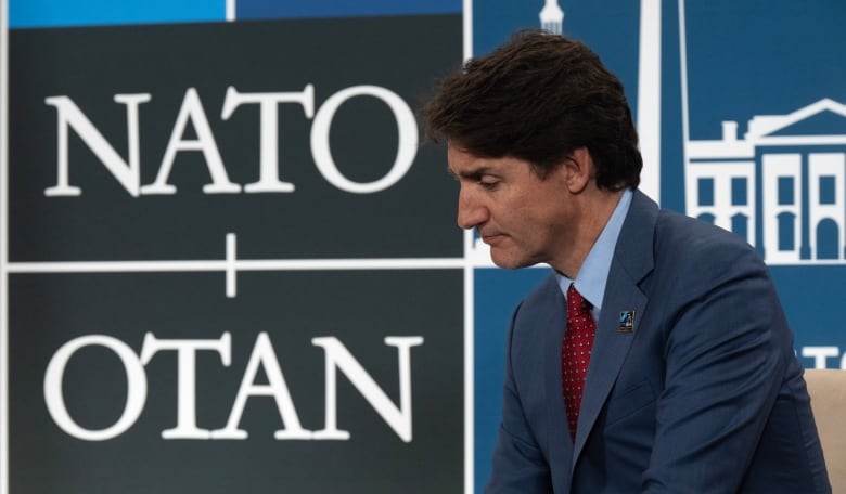 Prime Minister Justin Trudeau listens to New Zealand Prime Minister Christopher Luxon speak before a meeting at the NATO Summit in Washington, Wednesday, July 10, 2024.