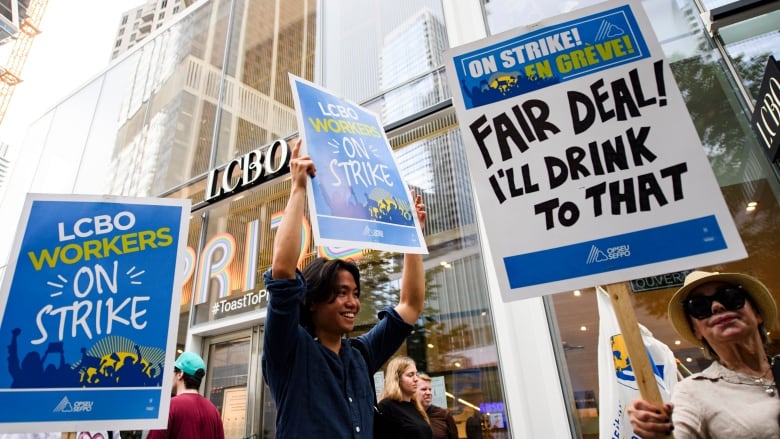 LCBO Workers and supporters hold a strike rally at a picket line in front of an LCBO store in Toronto on July 6, 2024.