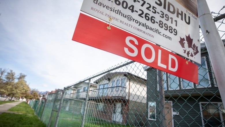 Houses are pictured in Vancouver, B.C on Thursday April 4, 2024 with a 