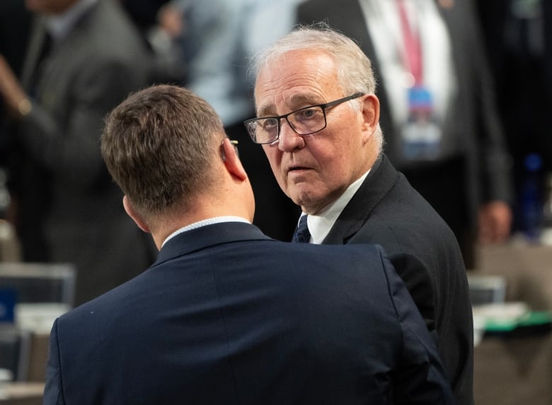 Minister of National Defence Bill Blair speaks with an international colleague before a meeting at the NATO Summit on Thursday, July 11, 2024 in Washington.