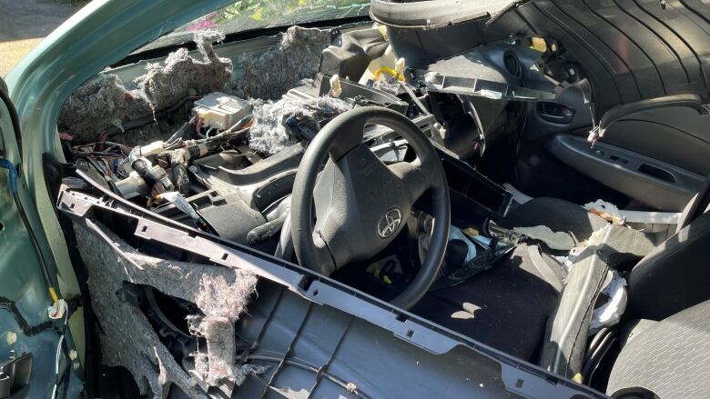 Interior of a car in ruins.