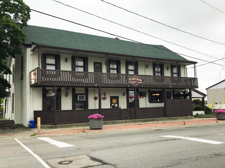 An old hotel on a street.