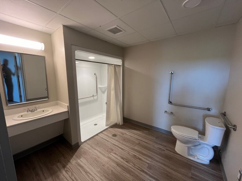  A sink near a toilet and shower