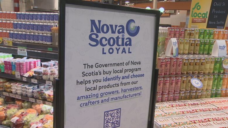 A blue and white sign that says nova scotia loyal