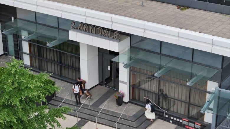 The entrance to a condo building is pictured.