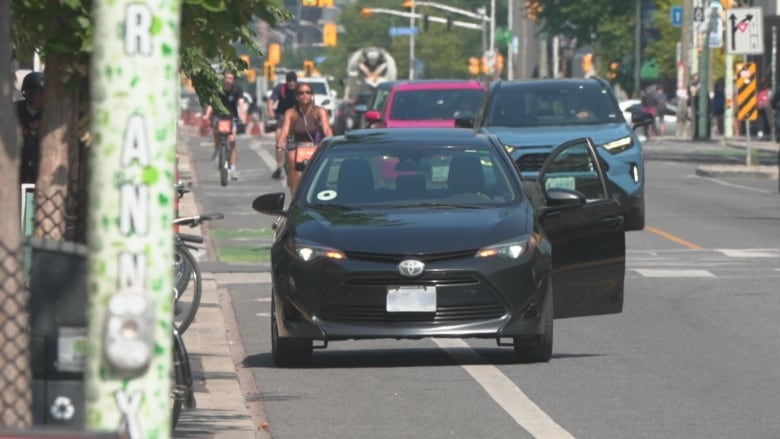 car parked in bike lane