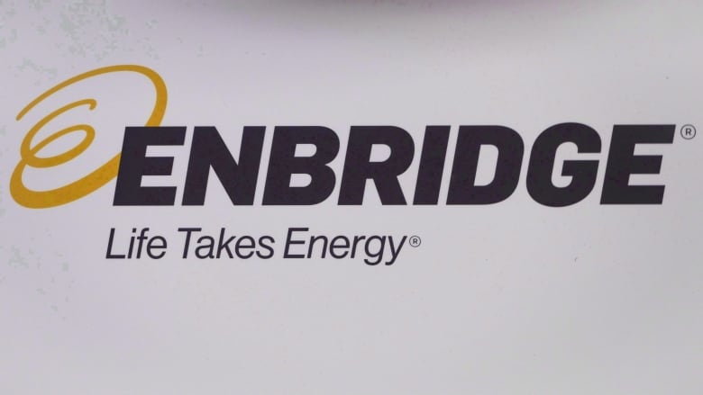 Black text on a white background that says Enbridge, Life Takes Energy accompanied by a yellow swirl logo.