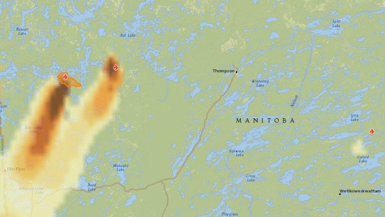 A map graphic of Manitoba shows wildfire smoke