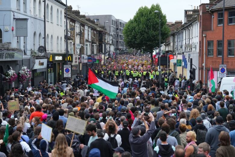 A crowd of protesters on the street.