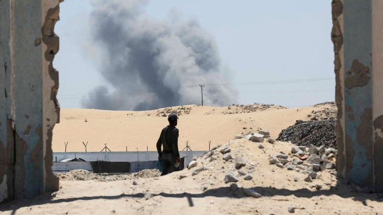 Smoke rises in Khan Younis in the southern Gaza Strip on Thursday, following Israeli airstrikes.